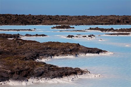 Blue hot geothermal pools among volcanic rocks in Iceland Stock Photo - Budget Royalty-Free & Subscription, Code: 400-04129031