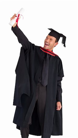 Happy attractive man celebrating his graduation Stock Photo - Budget Royalty-Free & Subscription, Code: 400-04129185