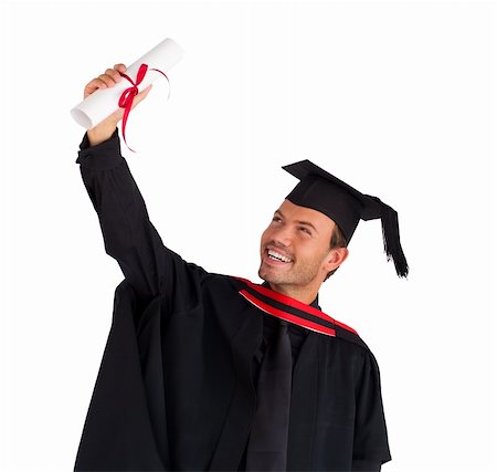 Closeup of an attractive boy celebrating his graduation Stock Photo - Budget Royalty-Free & Subscription, Code: 400-04129183