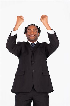 simsearch:400-05201934,k - Homme d'affaires afro-américaines avec les bras levés, souriant à la caméra Photographie de stock - Aubaine LD & Abonnement, Code: 400-04129259