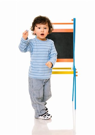 Little boy with chalkboard on white. Stock Photo - Budget Royalty-Free & Subscription, Code: 400-04129494