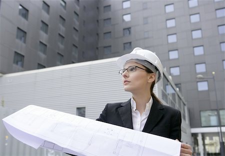 simsearch:400-09083291,k - architect woman working outdoor with modern buildings Stock Photo - Budget Royalty-Free & Subscription, Code: 400-04129647