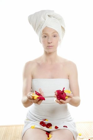 simsearch:400-04881818,k - Woman on her knees holding rose colorful petals, bath spa towel Foto de stock - Super Valor sin royalties y Suscripción, Código: 400-04129832