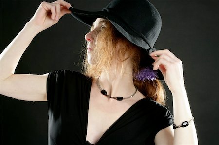 simsearch:400-04042499,k - beautiful redhead woman in black with hat and jewels Stock Photo - Budget Royalty-Free & Subscription, Code: 400-04129925