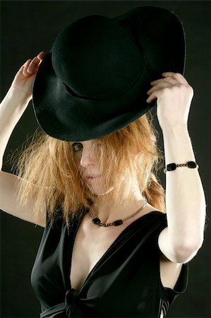 simsearch:400-04042499,k - beautiful redhead woman in black with hat and jewels Stock Photo - Budget Royalty-Free & Subscription, Code: 400-04129926