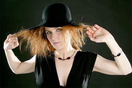 simsearch:400-04042499,k - beautiful redhead woman in black with hat and jewels Stock Photo - Budget Royalty-Free & Subscription, Code: 400-04129927