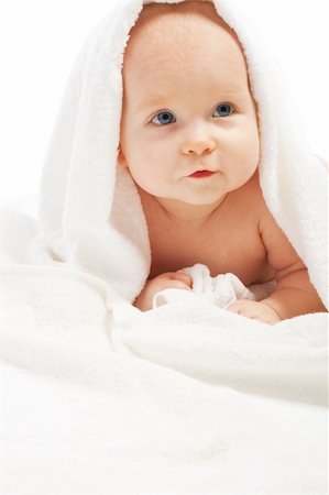 simsearch:400-05130009,k - Curious baby lying under white towel, isolated Stock Photo - Budget Royalty-Free & Subscription, Code: 400-04129922