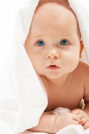 simsearch:400-04637418,k - Lovely baby lying under white towel, isolated Stock Photo - Budget Royalty-Free & Subscription, Code: 400-04129923