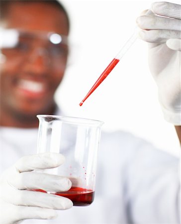 Young scientist holding chemicals in his hands Stock Photo - Budget Royalty-Free & Subscription, Code: 400-04129990