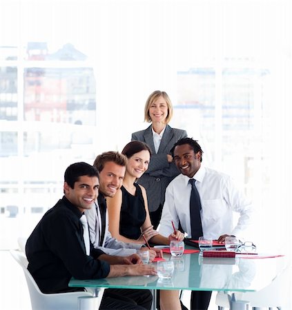 simsearch:400-04187120,k - International business team working together in a meeting Stock Photo - Budget Royalty-Free & Subscription, Code: 400-04121379