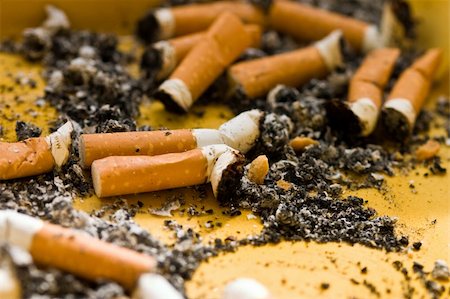 ashes and two cigarette stub in the ash tray Stock Photo - Budget Royalty-Free & Subscription, Code: 400-04121457