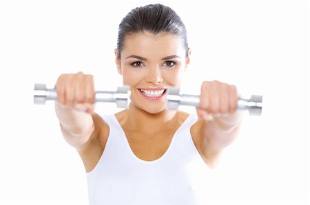 Young beautiful woman during fitness time with dumbbells Foto de stock - Super Valor sin royalties y Suscripción, Código: 400-04121521