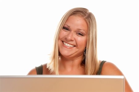 Smiling Beautiful Blonde Woman Using A Laptop. Stock Photo - Budget Royalty-Free & Subscription, Code: 400-04121849