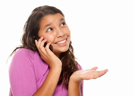 simsearch:400-04001639,k - Happy Pretty Hispanic Girl On Cell Phone Isolated on a White Background. Foto de stock - Super Valor sin royalties y Suscripción, Código: 400-04122654