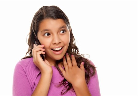 simsearch:400-04001639,k - Shocked Pretty Hispanic Girl On Cell Phone Isolated on a White Background. Foto de stock - Super Valor sin royalties y Suscripción, Código: 400-04122652