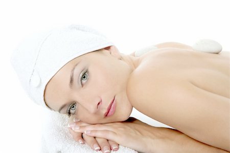 simsearch:400-04881818,k - Beautiful woman relaxed on spa with stone treatment, white background Fotografie stock - Microstock e Abbonamento, Codice: 400-04122978