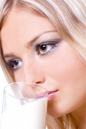 beautiful woman drinking milk on a white background Stock Photo - Budget Royalty-Free & Subscription, Code: 400-04123965