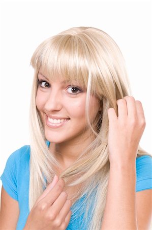 simsearch:400-04204790,k - jeune femme aux cheveux blonds. sur fond blanc Photographie de stock - Aubaine LD & Abonnement, Code: 400-04134282