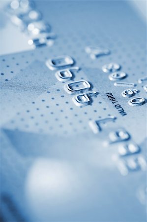 simsearch:400-04152511,k - Detail of credit card as background in blue tone Stock Photo - Budget Royalty-Free & Subscription, Code: 400-04134479