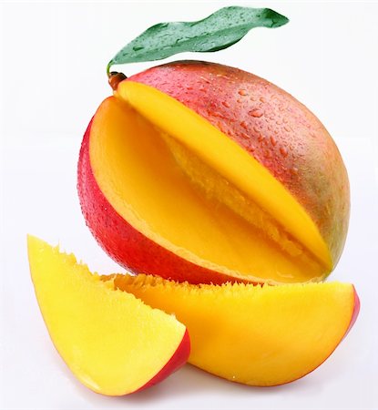 Mango with lobules on a white background Foto de stock - Royalty-Free Super Valor e Assinatura, Número: 400-04134585