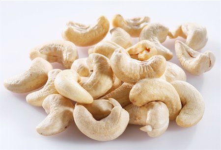 Nuts of cashews; Objects on white background Stock Photo - Budget Royalty-Free & Subscription, Code: 400-04134612