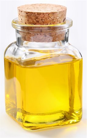 Bottle of olive oil on a white background Foto de stock - Royalty-Free Super Valor e Assinatura, Número: 400-04135197