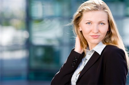 fashion corporate color - Beautiful blonde girl as business woman in front of office building Stock Photo - Budget Royalty-Free & Subscription, Code: 400-04135885