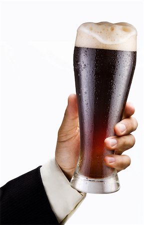 espuma (líquida) - Glass of beer is in a hand Stock Photo - Budget Royalty-Free & Subscription, Code: 400-04135927