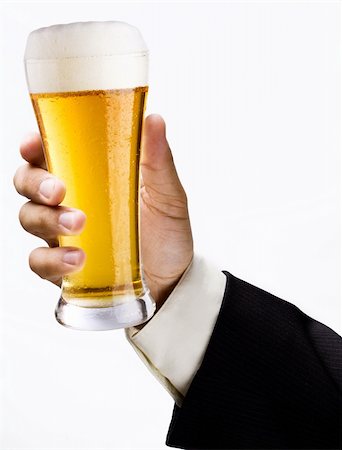 espuma (líquida) - Glass of beer is in a hand Stock Photo - Budget Royalty-Free & Subscription, Code: 400-04136344