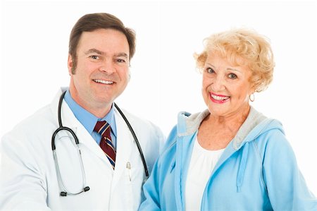 Pretty senior woman with her friendly, caring doctor.  Isolated on white. Stock Photo - Budget Royalty-Free & Subscription, Code: 400-04136465