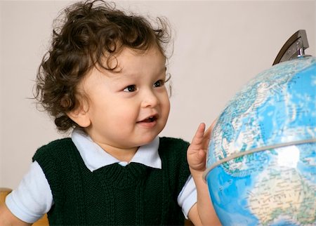 simsearch:400-04633938,k - Cheerful child with globe. Stock Photo - Budget Royalty-Free & Subscription, Code: 400-04136678