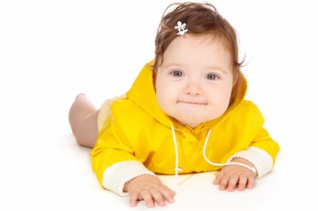 simsearch:400-04637418,k - Pretty baby girl in yellow, looking into camera Stock Photo - Budget Royalty-Free & Subscription, Code: 400-04136813