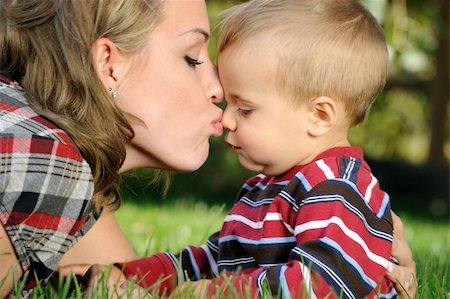 simsearch:400-04535025,k - Mother and child having fun in a park Stock Photo - Budget Royalty-Free & Subscription, Code: 400-04136998
