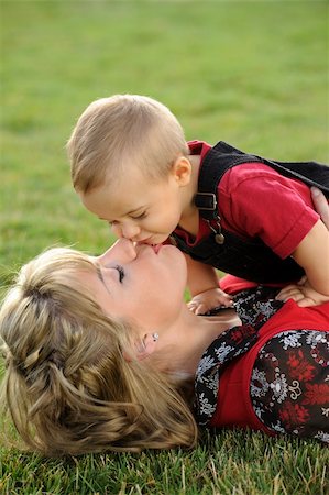 simsearch:400-04535025,k - Mother and child having fun in a park Stock Photo - Budget Royalty-Free & Subscription, Code: 400-04136991