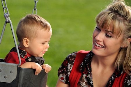 simsearch:400-04535025,k - Mother and child having fun in a park Stock Photo - Budget Royalty-Free & Subscription, Code: 400-04136993