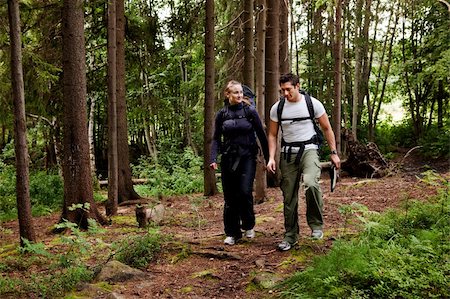 people on trail with map - A couple on a hiking camping trip in the forest Stock Photo - Budget Royalty-Free & Subscription, Code: 400-04137418