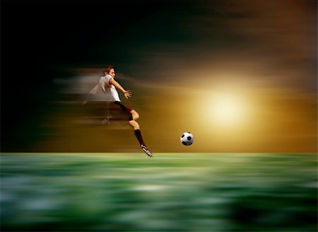 recreational sports league - joueur de soccer ou de football coups de pied boule Photographie de stock - Aubaine LD & Abonnement, Code: 400-04137468