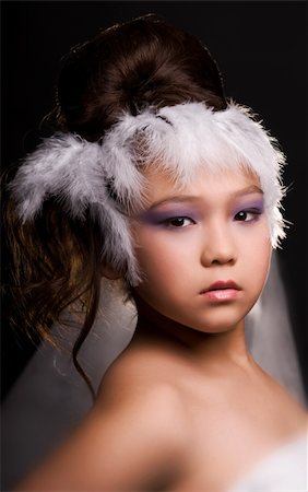 simsearch:400-04342150,k - asian beautiful girl with feather hut Stock Photo - Budget Royalty-Free & Subscription, Code: 400-04138150