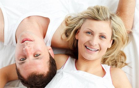 simsearch:400-04150404,k - Close-up of happy couple resting in bed Stock Photo - Budget Royalty-Free & Subscription, Code: 400-04138196