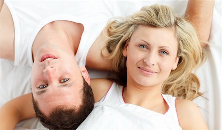 simsearch:400-04150404,k - Close-up of happy couple resting in bed Stock Photo - Budget Royalty-Free & Subscription, Code: 400-04138204
