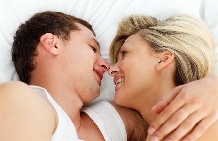 simsearch:400-04150404,k - Close-up of lovers looking each other in bed Stock Photo - Budget Royalty-Free & Subscription, Code: 400-04138201