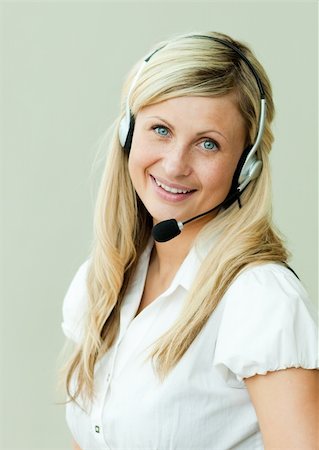 simsearch:400-04472832,k - Businesswoman working in an office with headset Stock Photo - Budget Royalty-Free & Subscription, Code: 400-04138242