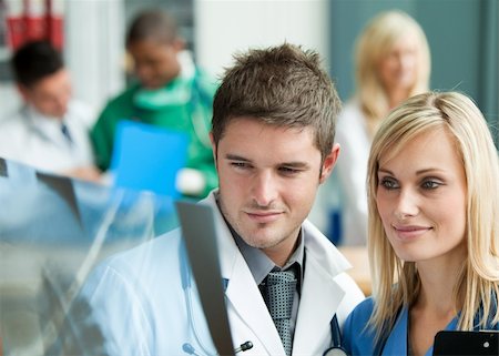 Doctors in hospital reception Stock Photo - Budget Royalty-Free & Subscription, Code: 400-04138319