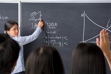 simsearch:400-04791676,k - A student asking to the teacher about mathematics Stock Photo - Budget Royalty-Free & Subscription, Code: 400-04138498