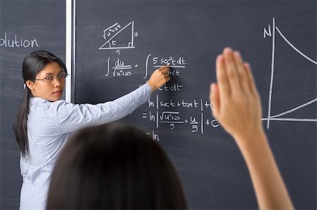 simsearch:400-04791676,k - A student asking to the teacher about mathematics Stock Photo - Budget Royalty-Free & Subscription, Code: 400-04138499