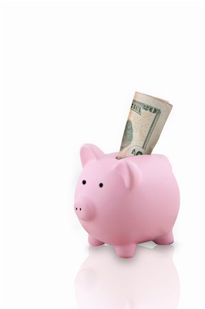 simsearch:400-04995456,k - Pink Piggy Bank isolated on white background and has a 20 dollar bill sticking out Foto de stock - Super Valor sin royalties y Suscripción, Código: 400-04130149