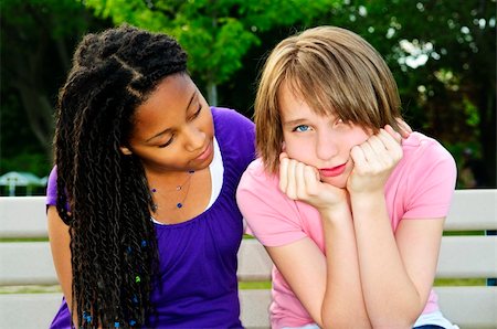 Teenage girl consoling her sad upset friend Stock Photo - Budget Royalty-Free & Subscription, Code: 400-04130253