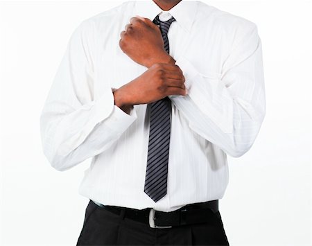 Gros plan du jeune homme d'affaires afro-américaines, corriger un lien cuff Photographie de stock - Aubaine LD & Abonnement, Code: 400-04130669
