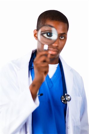 Young Afro-American doctor looking through a magnifying glass Stock Photo - Budget Royalty-Free & Subscription, Code: 400-04130704