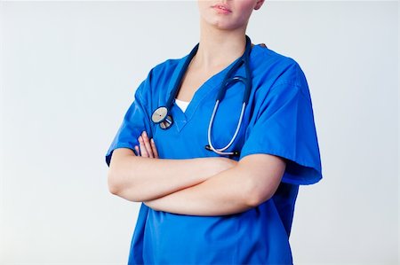 simsearch:400-07976201,k - Female Doctor with standing before camera Stock Photo - Budget Royalty-Free & Subscription, Code: 400-04130905